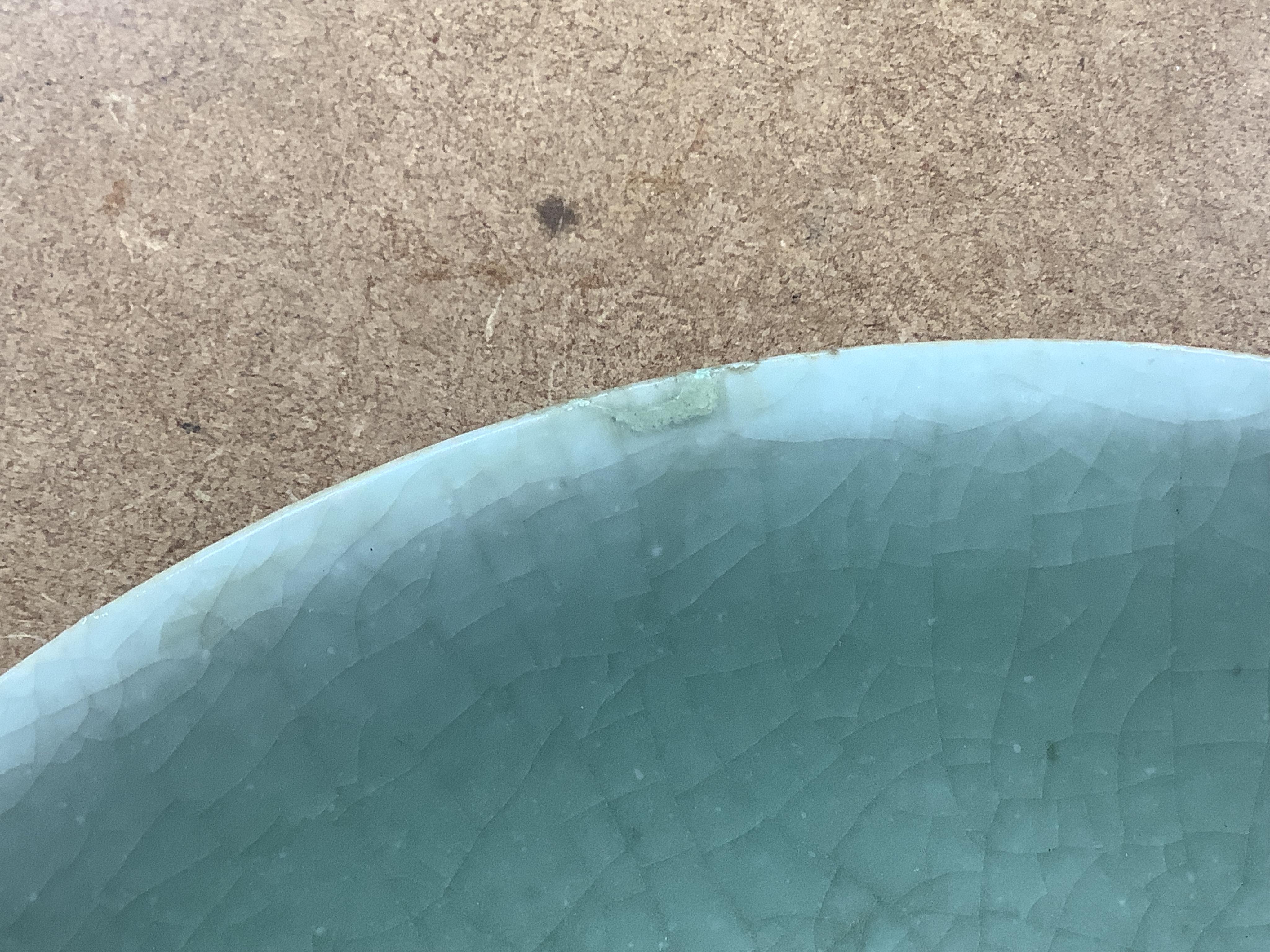 A Chinese celadon glazed dish, late Qing, 34cm in diameter